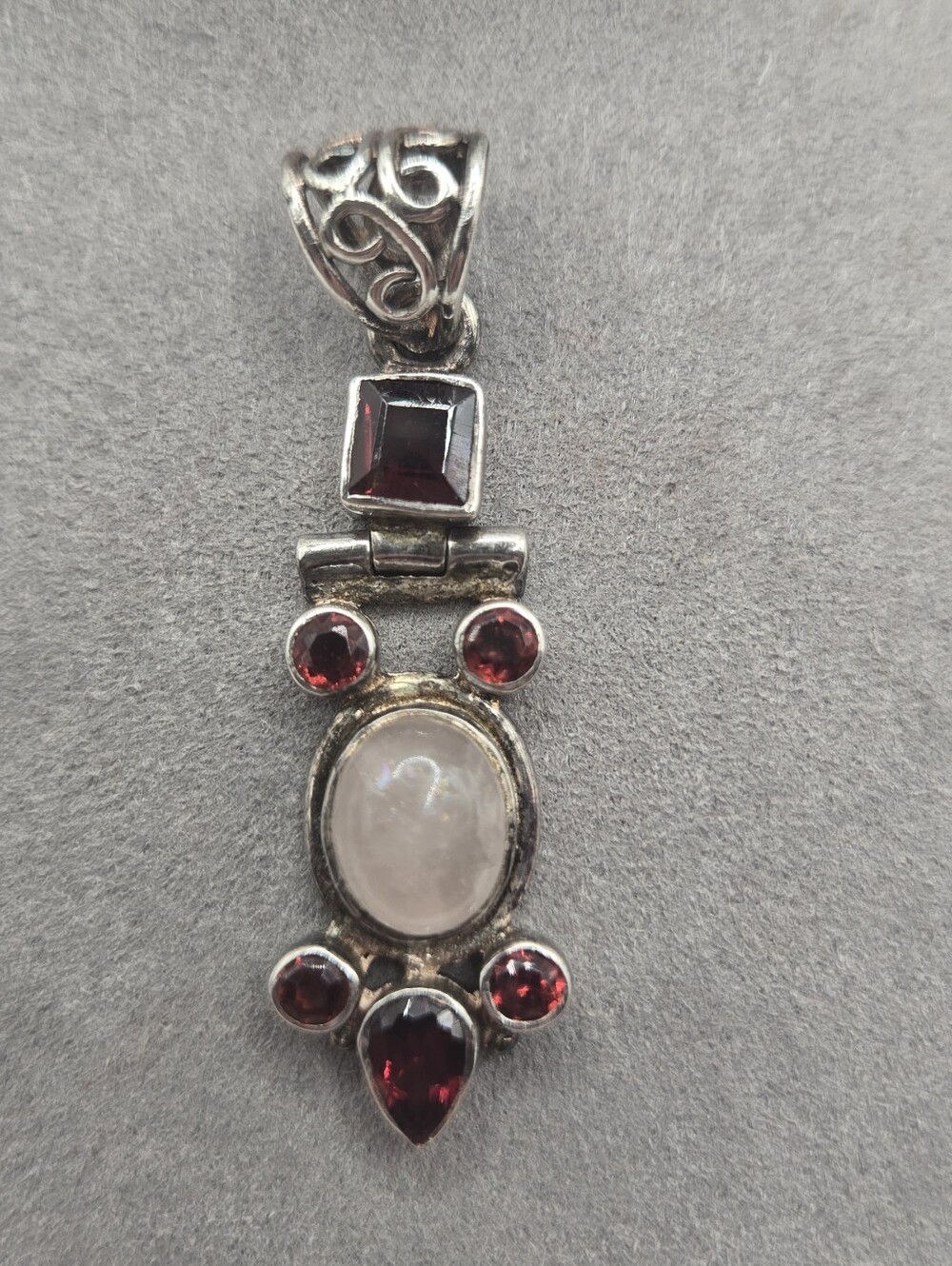 Source Unknown Silver Moonstone Pendant with Red Garnets